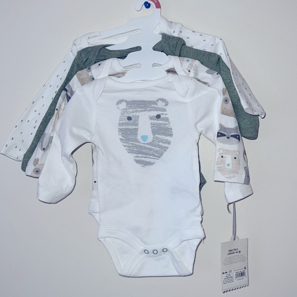 4 pack of NB long sleeve onsie